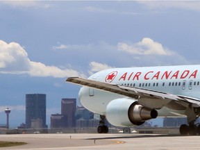 An Air Canada flight taking off from the Calgary International Airport on June 28, 2014.