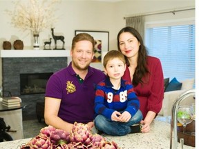 Andrea Martinez and Christian Wagner with son Phillip in their new home by Excel Homes in the Mountainview community of Okotoks. Don Molyneaux for the Calgary Herald.