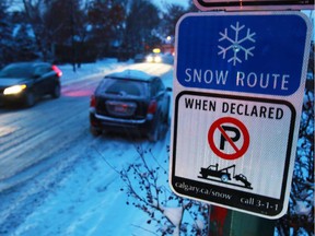 Traffic moves along a Calgary snow route. (File photo.)