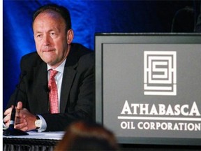 Athabasca Oil’s ex-CEO Sveinung Svarte, seen here at a company meeting, is now a board director. Replacement Tom Buchanan vowed change in his first conference call as CEO Friday.