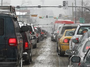 Traffic backs up on Centre Street North, one of several streets leading into downtown with lane reversals.