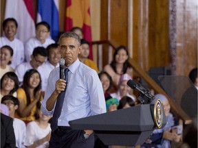 US President Barack Obama gestures during an event at Yangon University in Yangon Myanmar on Nov. 14, 2014.