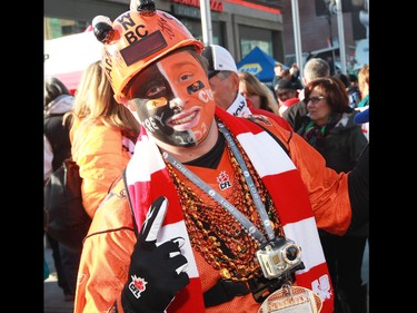 Hamilton Tiger Cats fans get ready to cheer outside B.C. Place before the 2014 Grey Cup in Vancouver on Sunday November 30, 2014.
(Gavin Young/Calgary Herald)