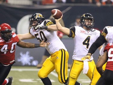 Hamilton Tiger Cats QB Zach Collaros under pressure during the 2014 Grey Cup in Vancouver on Sunday November 30, 2014.