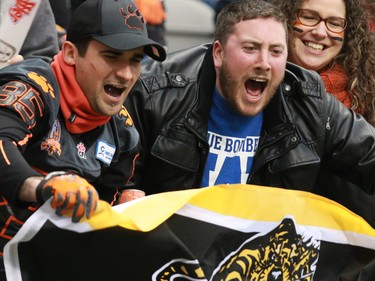 Hamilton Tiger Cats fans show their emotion during the 2014 Grey Cup in Vancouver on Sunday November 30, 2014.