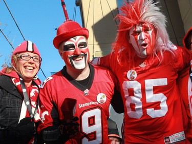Calgary Stampeders cheer outside B.C. Place before the 2014 Grey Cup in Vancouver on Sunday November 30, 2014.