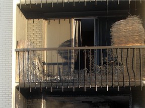 The aftermath of the fire in one apartment at 827 Glenmore Trail SW .