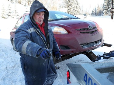 Joel Williams was being kept busy picking up vehicles that skidded out of control on icy roads.Calgarians were digging out after a snow storm left most of Alberta blanketed in snow and bone chilling temperatures on November 29, 2014.