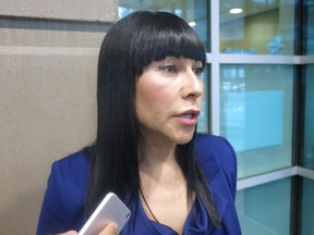 Calgary defence lawyer Tonii Roulston tells reporters in Calgary that her client, former Canadian soldier Glen Gieschen, is sorry for planning to attack the Calgary office of Veterans Affairs on Thursday, November 27, 2014.