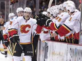 Calgary Flames defenceman TJ Brodie, left, seen celebrating a goal against the Anaheim Ducks earlier this week, is in the conversation for the NHL all-star game.