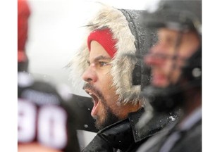 Calgary Stampeders running back Jon Cornish yells at the refs from the sidelines in the second half after he had to leave Saturday's game against the Winnipeg Blue Bombers at McMahon Stadium November 1, 2014.