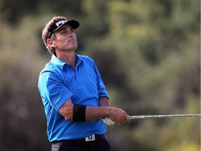 CALGARY, AB;  AUGUST 26, 2014  -- Canadian Scott Allred tees off on the 12th hole during the Shaw Charity Classic qualifying round at Canyon Meadows Golf Club Tuesday August 26, 2014. (Ted Rhodes/Calgary Herald) For Sports story by George Johnson