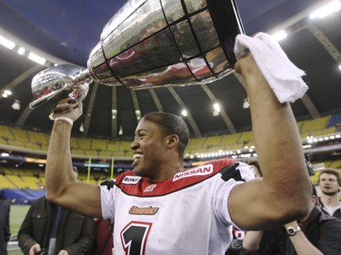 Henry Burris of the Calgary Stampeders celebrates after the Stamps' Grey Cup win.