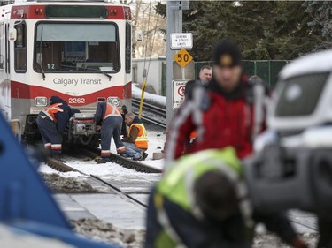 A truck is hit by the C-train while crossing the track at the intersection of 9 Street SW and 4 Avenue SW in Calgary, on November 20, 2014. --