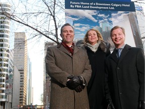 Andrew Boblin, vice-president of development with PBA Land Development Ltd., left, Patricia Phillips, CEO of PBA and  PBA chief financial officer Todd Schaan stand on the site of a new downtown hotel PBA plans to build. The site is immediately east of 510 5th Tower on 5th Avenue S.W.