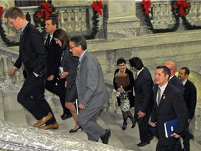 Alberta Wildrose Party Leader Danielle Smith and members of her party walk through the Alberta Legislature on there way to session on November 25, 2014, one day after Ian Donovan and Kerry Towle left the Wildrose Party and crossed the floor to join the Progressive Conservative Party.