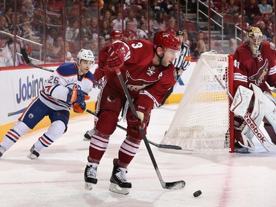 Phoenix Coyotes center Joel Perrault (26) is congratulated by