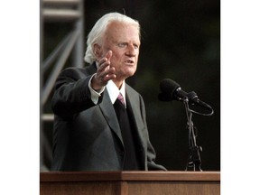 **FILE**The Rev. Billy Graham speaks to  a crowd on the second night of the Greater New York Billy Graham Crusade Saturday, June 25, 2005 at Flushing Meadows Corona Park in Queens, New York. With Graham retiring, many Christians are wondering whether the large style of revival meeting he pioneered will end with him.