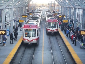 Commuters at the City Hall CTrain station on November 4, 2014.