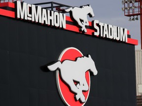 CALGARY, AB: NOVEMBER 06, 2014 --  STK. McMahon Stadium sign and Stampeders logo.