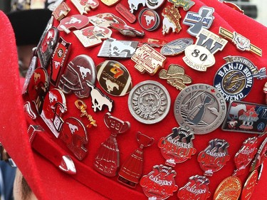 Stampeder fan Cheryl Graham's stetson was a sea of football pins at the Calgary Grey Cup Committee pancake breakfast at Canada Place in Vancouver on Thursday November 27, 2014.