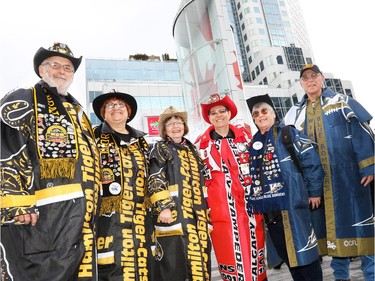 CFL Fans showed their colours at the Calgary Grey Cup Committee pancake breakfast at Canada Place in Vancouver on Thursday November 27, 2014.