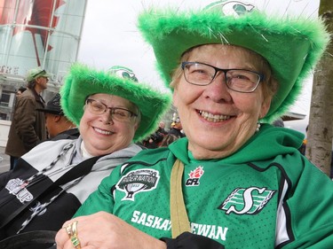 Rider fans and sisters-in-law Patricia and Audrey Morris showed their colours at the Calgary Grey Cup Committee pancake breakfast at Canada Place in Vancouver on Thursday November 27, 2014.