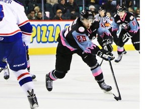 Greg Chase competes for the Calgary Hitmen against the Regina Pats during a game earlier this month.