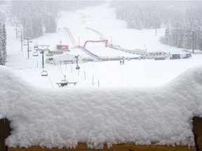 Heavy snow covers the landscape following the cancellation of the second training run for the World Cup men's downhill ski race in Lake Louise, Alta. on Thursday November 27.