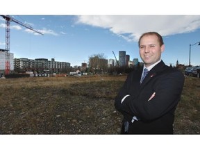 Joel Armitage, director at the Office of Land Servicing and Housing for the City of Calgary, in one of the undeveloped plots at The Bridges project. Wil Andruschak for the Calgary Herald