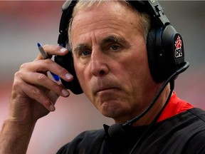 Calgary Stampeders' head coach John Hufnagel stands on the sideline