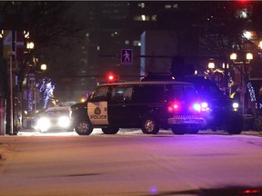 Police control the scene of an armed robbery at the Bank of Montreal, 2302 4th Ave S.W.