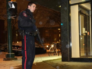 Police shut down 4th Street  S.W. as they investigate a suspected armed robbery on Wednesday at the Bank of Montreal at 23rd Avenue S.W.