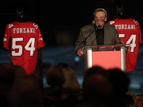 Tom Forzani speaks Thursday night during the public celebration of life for his late brother, John Forzani, at the Red and White Club in Calgary.