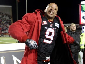 Calgary Stampeders Jon Cornish celebrates after the Stampeders win the West Final against the Edmonton Eskimos at McMahon Stadium in Calgary.
