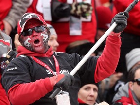Calgary Stampeders fan in the stands during the Western Final at McMahon Stadium in Calgary.