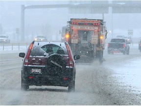Slick road conditions made for a slippery Sunday as temperatures plunged along with snowflakes.