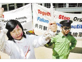 Falun Gong participants protest China's persecution. Reader says her daughter is imprisoned in China and hopes Prime Minister Stephen Harper will press for her release on his current trip.