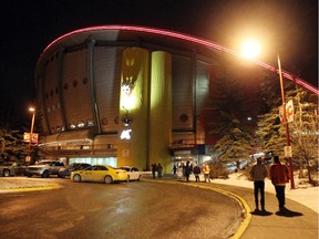 Fans walk into the Scotiabank Saddledome on November 20, 2014.