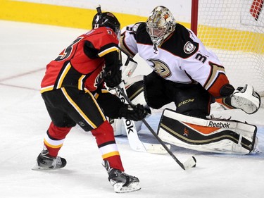 Colleen De Neve/ Calgary Herald CALGARY, AB --NOVEMBER 18, 2014 -- Calgary Flames left winger Johnny Gaudreau waited to unleash his shot on Anaheim Ducks goalie Frederik Andersen in overtime during third period NHL action at the Scotiabank Saddledome on November 18, 2014. The Flames defeated the Anaheim Ducks 4-3 in overtime. (Colleen De Neve/Calgary Herald) (For Sports story by Scott Cruickshank) 00056694A  SLUG: 1119-Flames Ducks