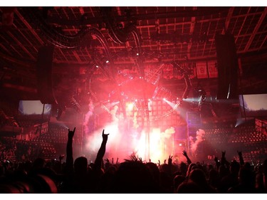 The crowd watched as fireworks went off as rock legends Motley Crue took to the stage in front of a sold out crowd at the Saddledome on November 19, 2014.