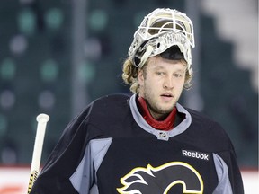 Karri Ramo #31 of the Calgary Flames skates during practice  in Calgary on Friday November 21, 2014.