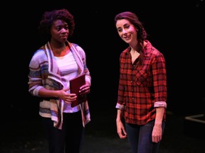 Monice Peter, left,  and Stacie Harrison in a scene from  A Beautiful View at Vertigo Studio Theatre in Calgary. (Leah Hennel/Calgary Herald)