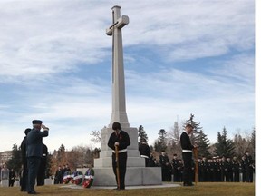 The No Stone Left Alone ceremony where Canadian Forces soldiers and students place poppies on all military graves at Burnsland Cemetery in Calgary on Thursday.