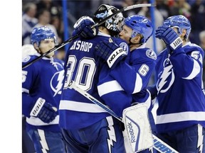 Tampa Bay Lightning defenceman Anton Stralman hugs goalie Ben Bishop during a win over Washington earlier this month. He had a very brief stay on the Calgary Flames roster.