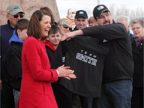 Wildrose party leader Danielle Smith was presented with a Team Smith jacket from local candidate Ian Donovan during a campaign stop in Vulcan on April 6, 2012.