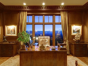 "His” and “Hers” offices  are separated by the wood-carved oval library and flanked by the Gentlemans’/Cigar room with special ventilation and fireplace hearth from an estate in San Francisco.