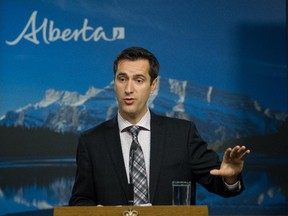 Rob Anderson speaks to the media during a press conference at the Alberta Legislature in Edmonton on Nov. 26, 2014. Less than one month later, he joined the party he worked so hard to overthrow.