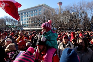 Calgary Stampeders fan Zoey Magee on her dad's shoulders during the Grey Cup Champions rally at City Hall in Calgary.