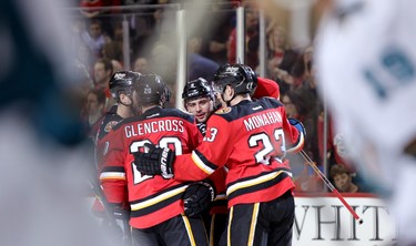 CALGARY;  DECEMBER 6, 2014  -- Calgary Flames Mark Giordano celebrates his goal on San Jose Sharks with teammates during their game at the Scotiabank Saddledome in Calgary on December 6, 2014.
(Leah Hennel/Calgary Herald)  
For Sports by Kristen Odland